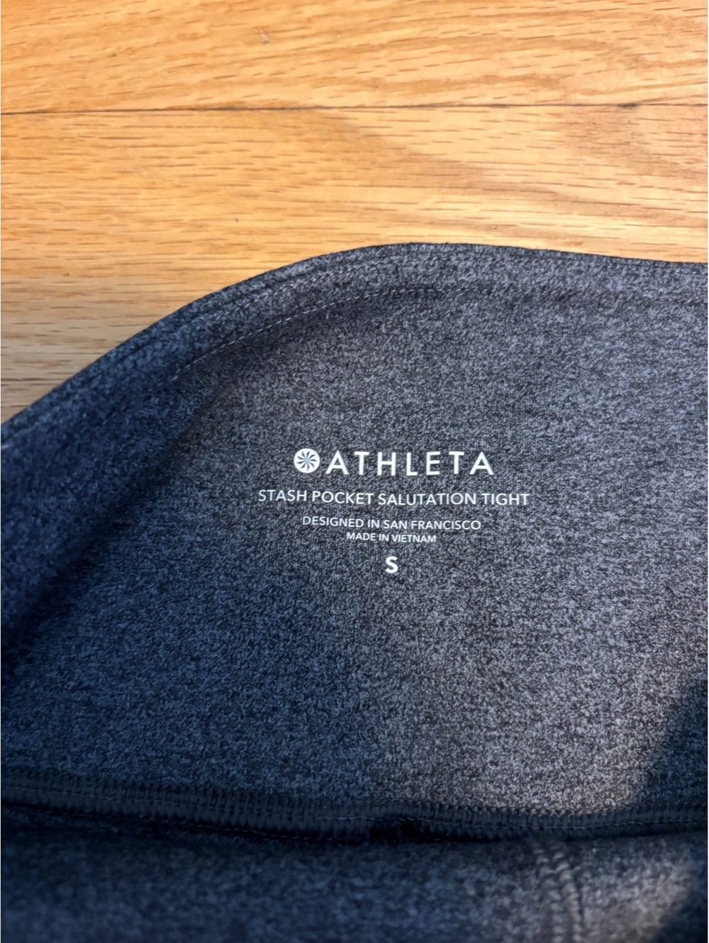 Athleta Stash Pocket Salutation Tight Leggings Size S